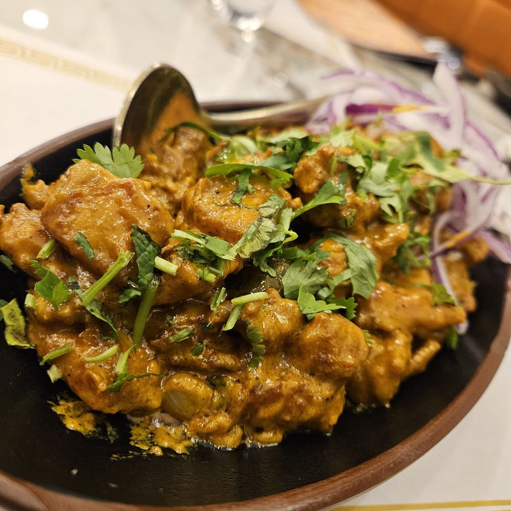 Nawabi Hyderabad House signature dishes Chicken Dum BiryaniMadhurai Chicken PakodaButter Chicken Masala